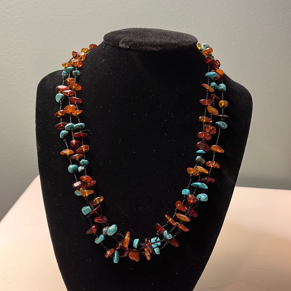 N12. Triple stranded turquoise necklace.